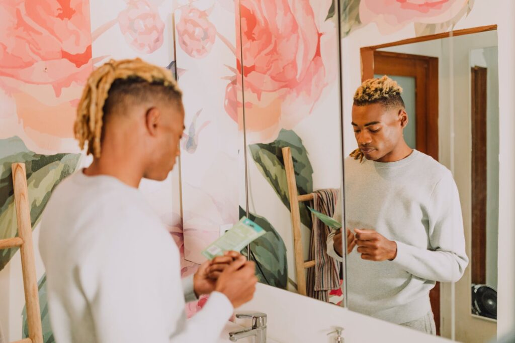 a man holding a skincare product